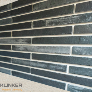 Facade cladding with AACHEN SCHWARZGRAU brick slips from the KLINKER LINE collection - Klinker Made in Germany Facade cladding with AACHEN SCHWARZGRAU brick slips from the KLINKER LINE collection