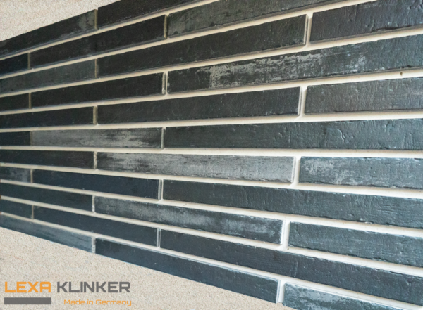 Facade cladding with AACHEN SCHWARZGRAU brick slips from the KLINKER LINE collection - Klinker Made in Germany Facade cladding with AACHEN SCHWARZGRAU brick slips from the KLINKER LINE collection