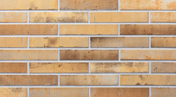 NATURE brick slips - Klinker Made in Germany brick slips NATURE, BOSTON: yellow-sand and beige shades with charcoal-brown areas.